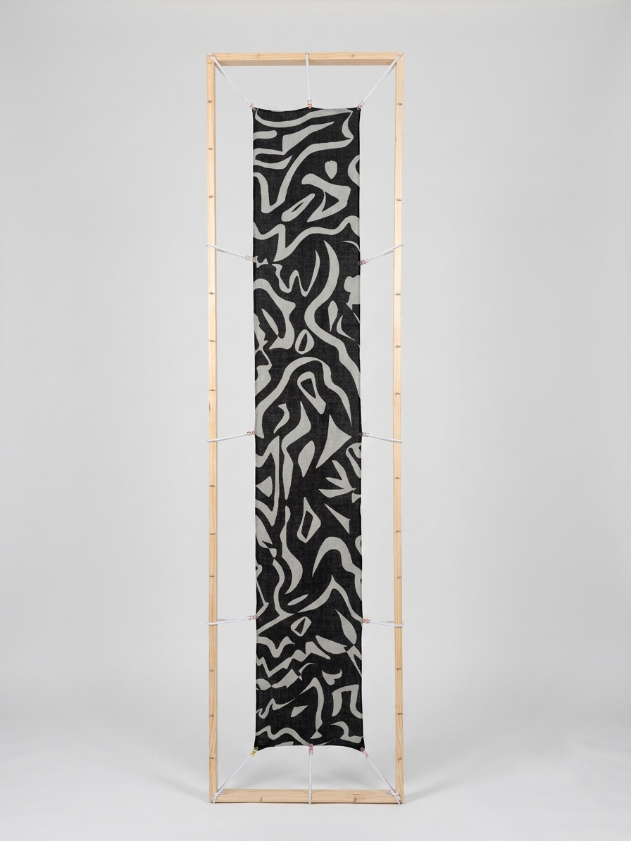 Premium long silk wool blend scarf, measuring 30x180cm, in the "Tectonic Monochrome" design, featuring a bold abstract graphic pattern of dark grey and deep black shapes, styled in an upright wrap format against a clean white background.
