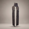 Long narrow knit wool scarf in a heathered charcoal grey and black pattern by B108 Design, floating against a neutral studio background.