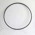 Recycled Polymer Dance Hoop in Obsidian Black on a white backdrop - B108 DESIGN