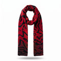 Front view of the Tectonic Ember luxury silk-wool scarf by B108 Design draped in a loop, featuring an abstract black linear graphic pattern printed on a rich red background.