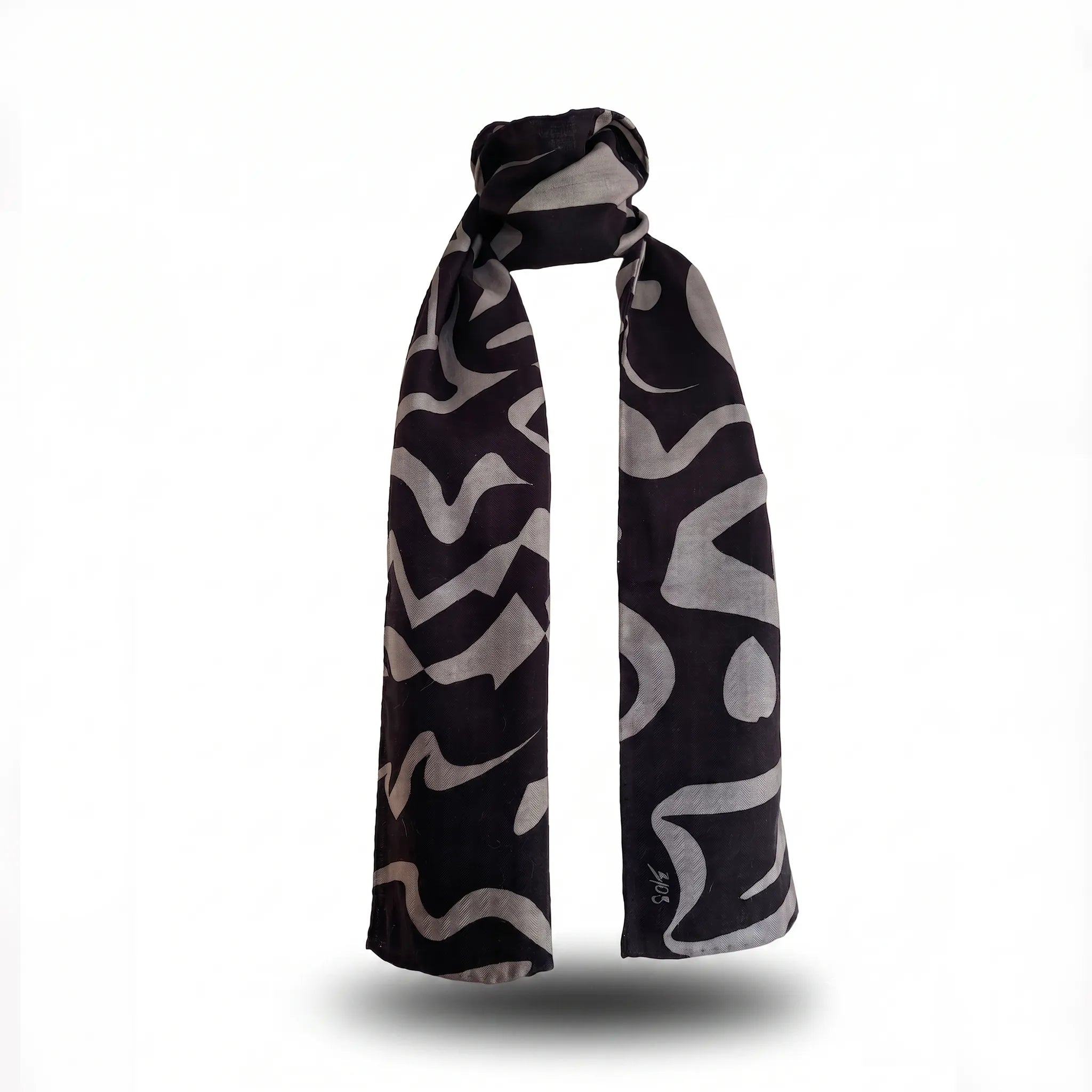B108 Tectonica Wool-Silk Scarf in Monochrome featuring a bold abstract grey and black graphic pattern wrapped against a white background.