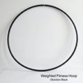 Weighted fitness hula hoop for adults in Obsidian Black, featuring untaped natural grip tubing for professional core workouts.